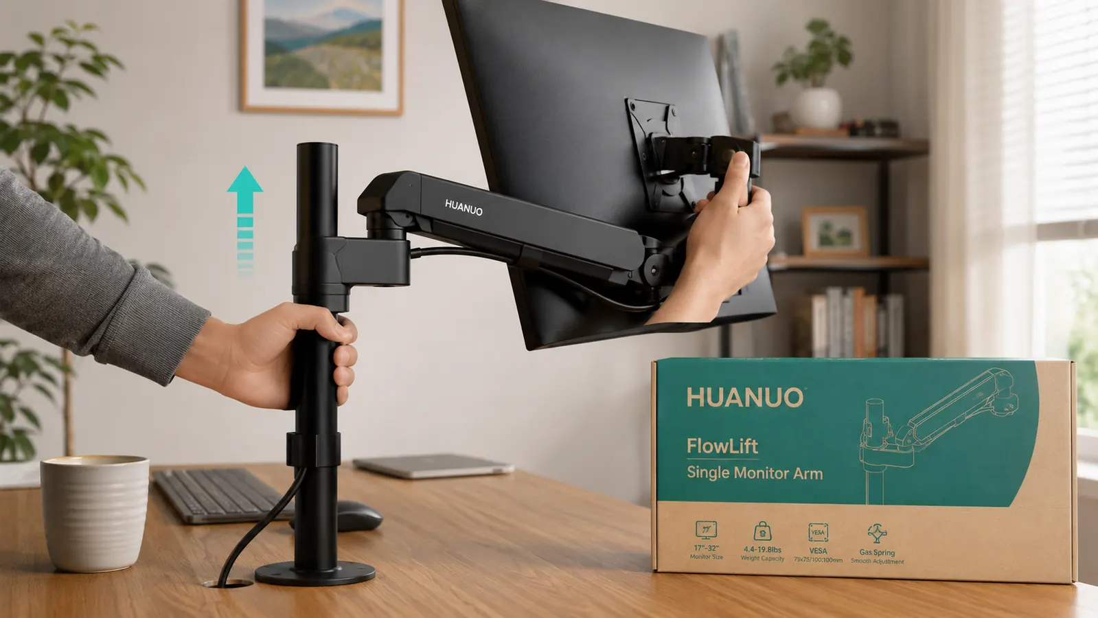 Hand adjusting the height of the HUANUO monitor arm on a white desk
